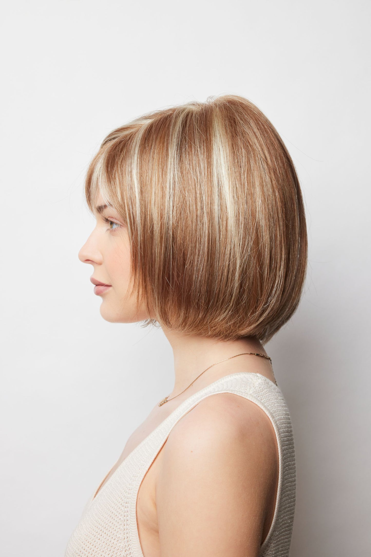 Erika Wig by Amore – Sleek Medium-Length Bob | Monofilament Top | Synthetic Fibre